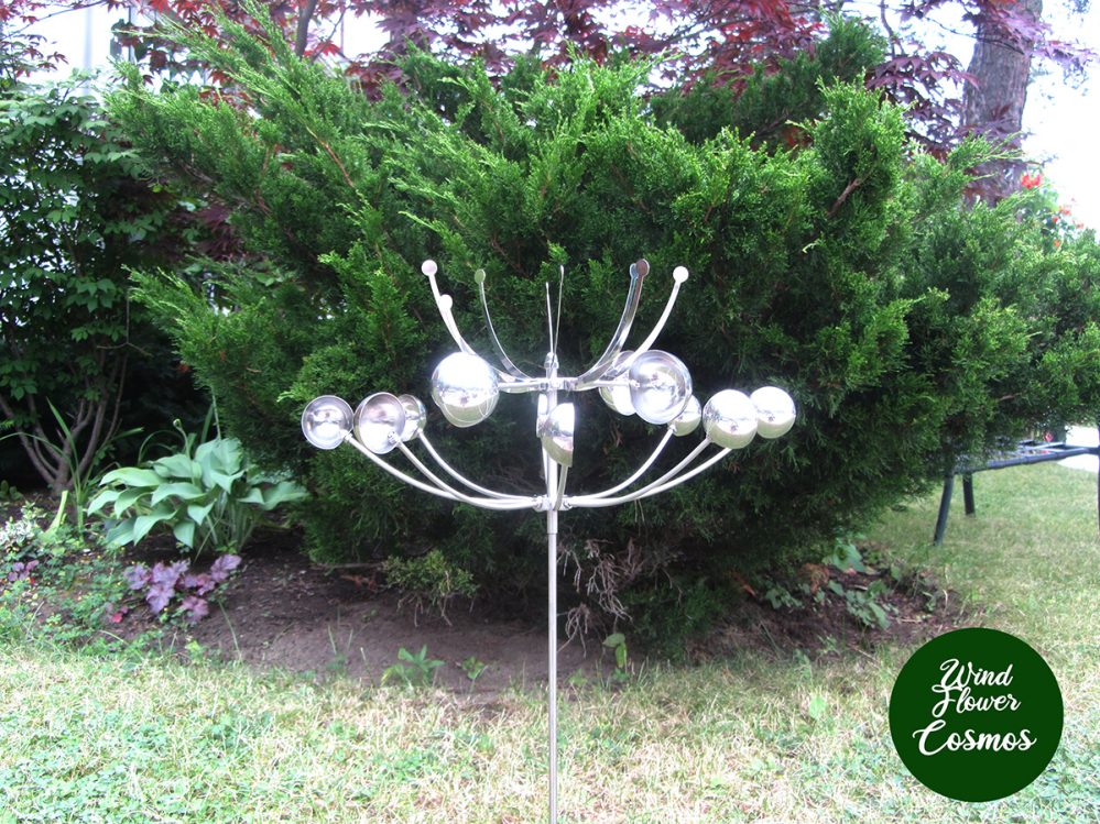 Cosmos Wind Flower Kinetic Wind Spinner rotating in the breeze.
