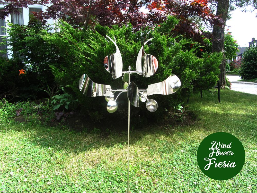 Fresia Wind Flower Kinetic Wind Spinner rotating in the breeze.